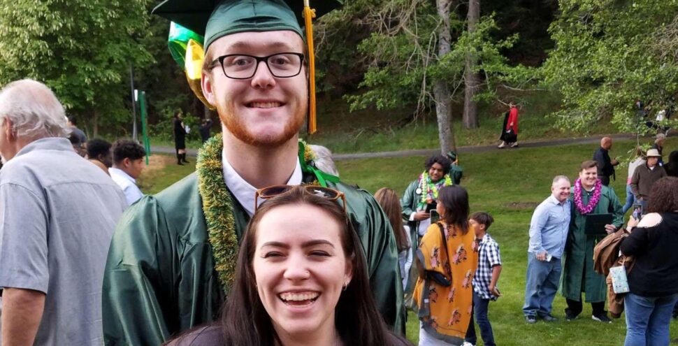 Young couple at graduation. New family starting out.