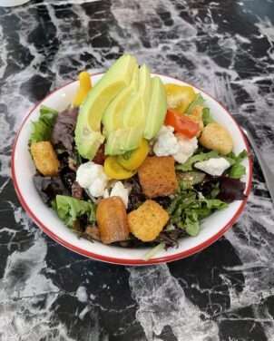 Picture of healthy salad vegetables with avacado healthy fats