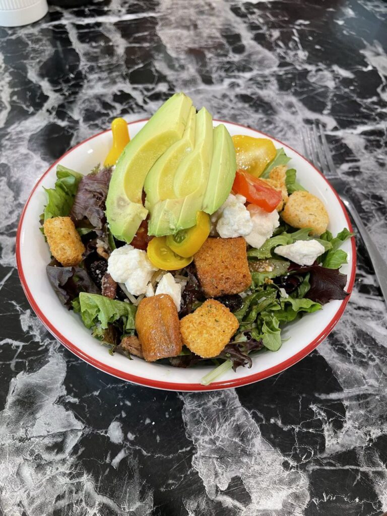 Picture of healthy salad vegetables with avacado healthy fats