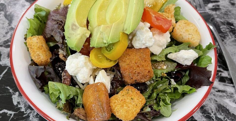 Picture of healthy salad vegetables with avacado healthy fats