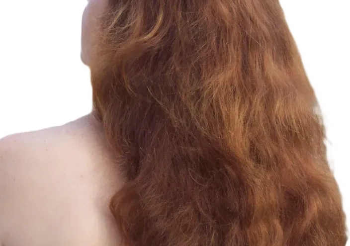 woman with long flowing red hair