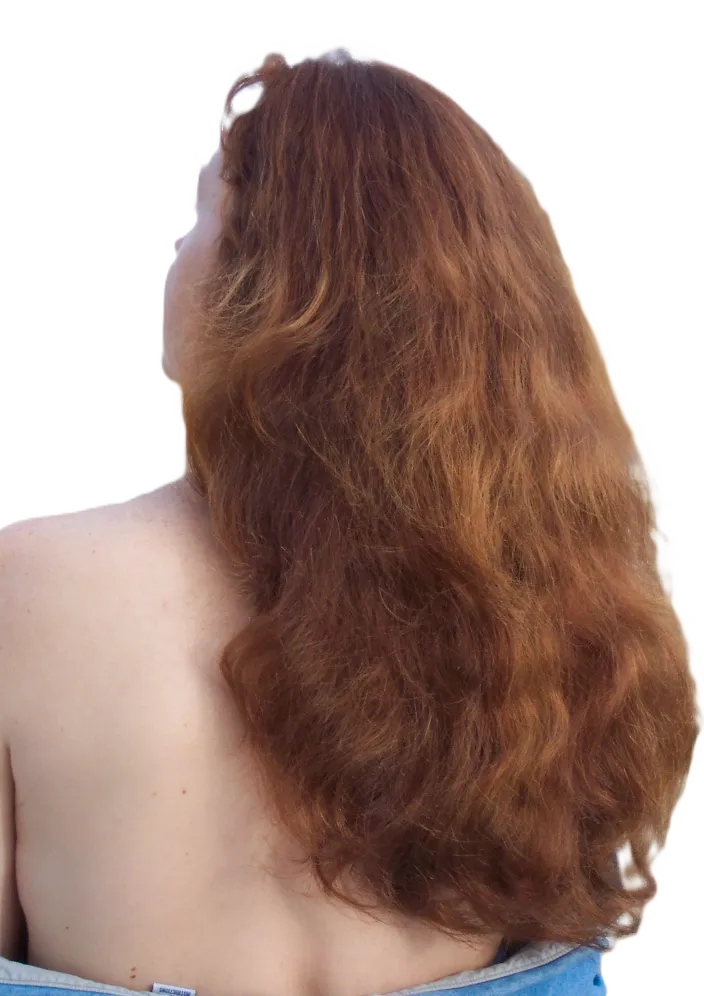 woman with long flowing red hair